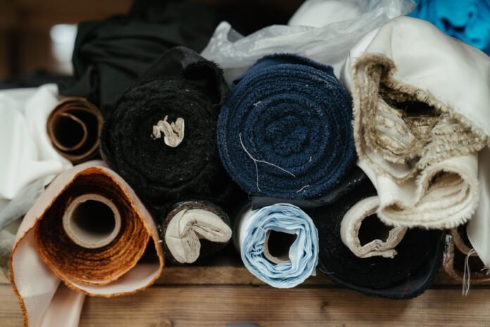 India MMF textile manufacturing, PM MITRA parks, India textile PLI scheme, cotton vs man-made fibre India, technical textiles India