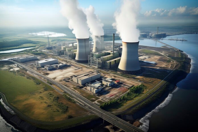 view-nuclear-power-plant-with-towers-letting-out-steam-from-process